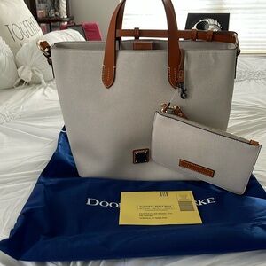 Cream color Dooney & Burke handbag